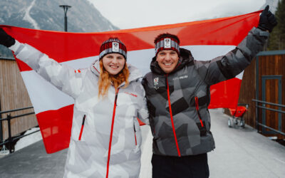 Aigner und Salcher tragen die Fahne bei der Eröffnungsfeier